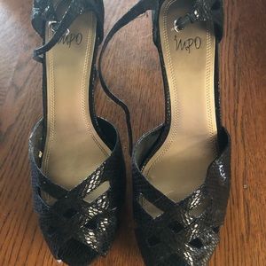 Women’s black snake heels